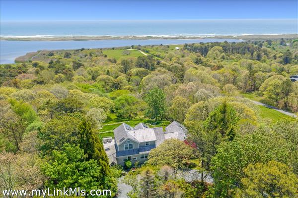 Waterfront four bedroom home with private beach and dock