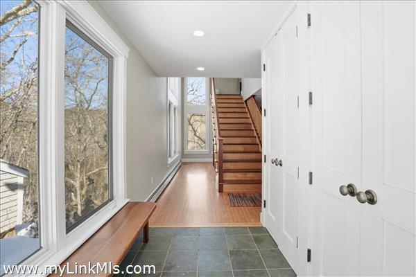 Foyer with three large closets