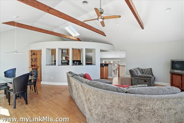 Livingroom to kitchen high vaulted ceilings