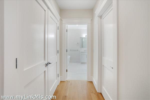 1st floor primary bedroom private hallway to bath