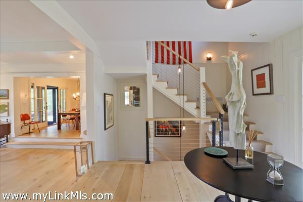 Stairs lead to the lower level