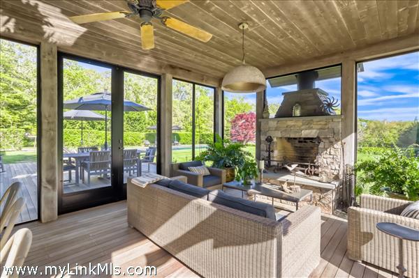 with field stone wood burning fireplace