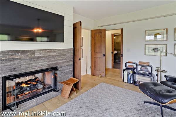 Cozy double sided gas fireplace