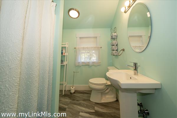 Beautiful full bathroom in the bonus space above the garage.