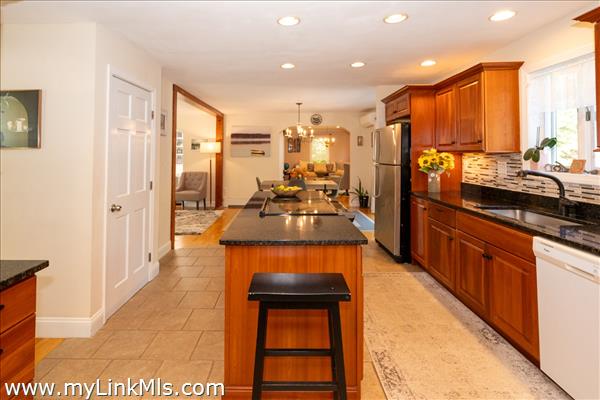 View of the kitchen towards the dining area and family room.