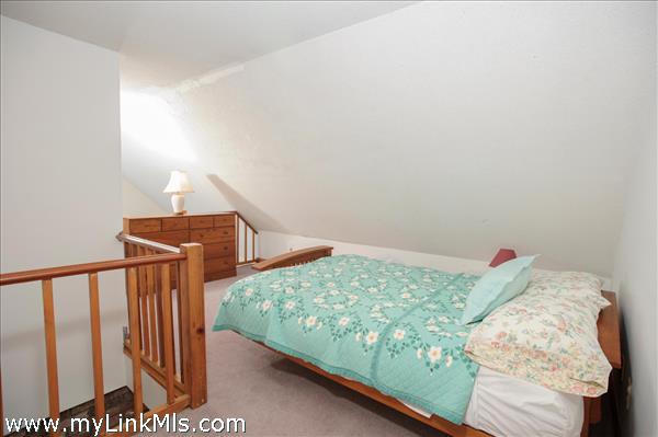Loft space with bed