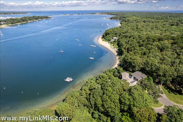 Lagoon waterfront with private beach and views out to Vineyard Sound.