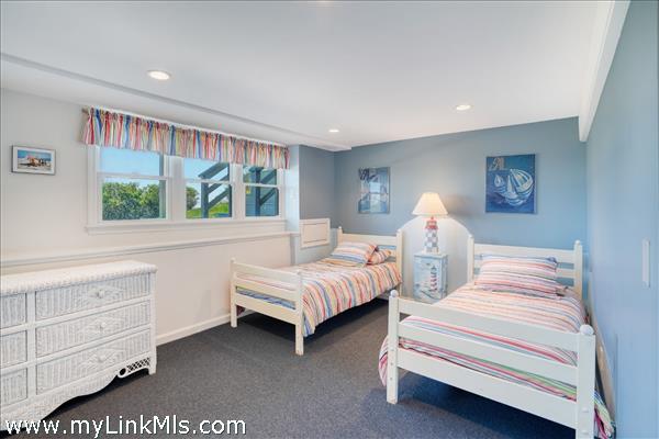 Lower level area with dedicated overflow guest quarters.