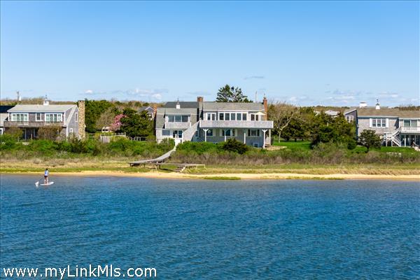 Aerial perspective highlighting the property's expansive frontage on Katama Bay.