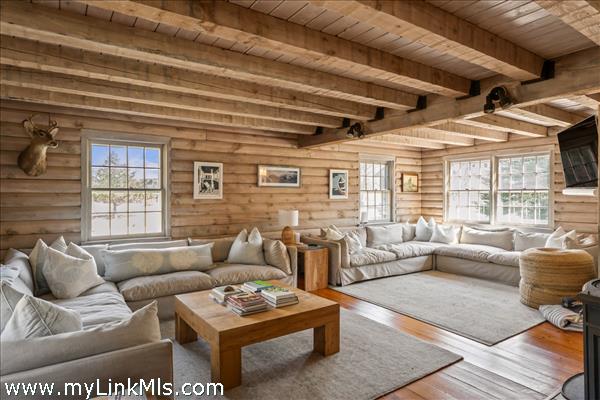 Living room with custom decor, bespoke wood tables and textiles, new furnishings from Vineyard Decorators.