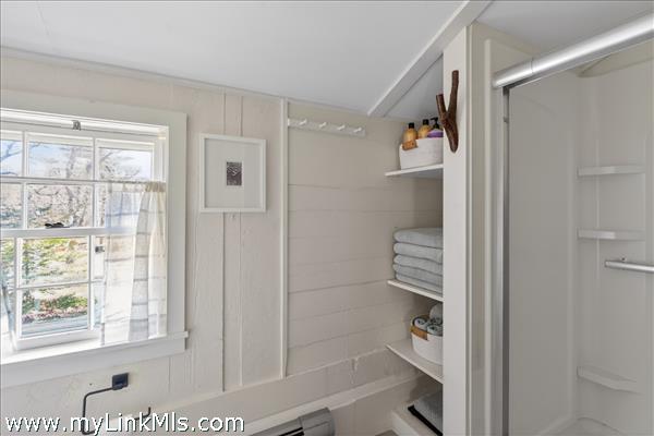2nd flr Full Bath with shower and built-in linen closet