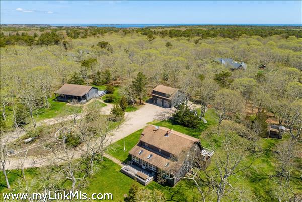 Your Vineyard homestead awaits on 3.05 acres abutting conservation land and minutes from miles of sandy south shore beach