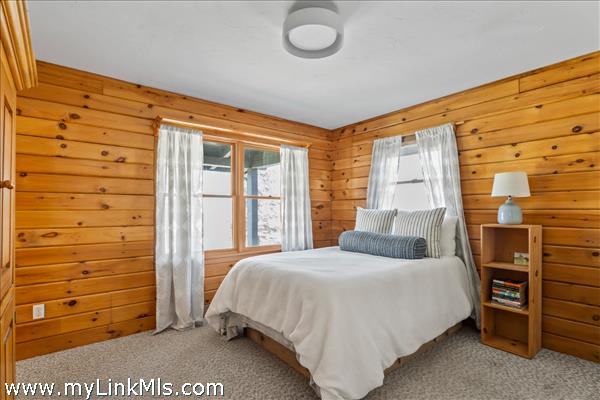 Guest house primary bedroom with ensuite bath