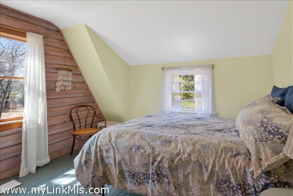 2nd flr - Bedroom 3 charming and bright with wood accent wall