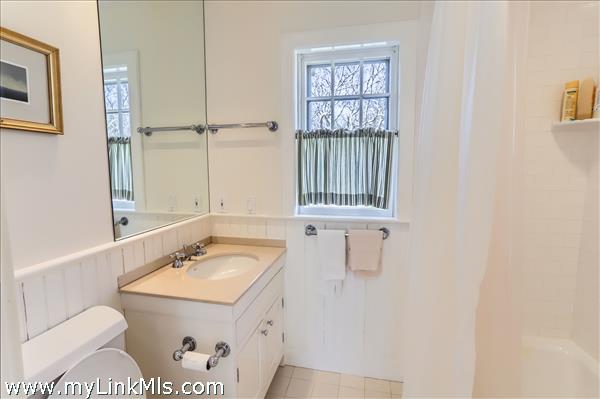 Full Bath For Two Bedrooms Off Kitchen
