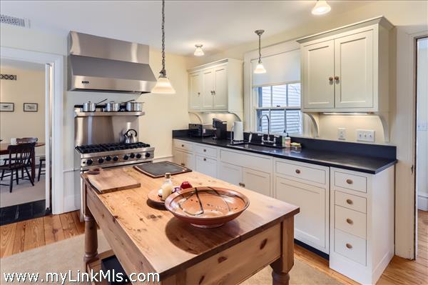 with modern range and integrated appliances
