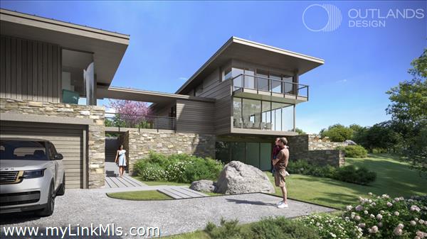 There is additional parking and a generous garage below the guest bedroom suite.