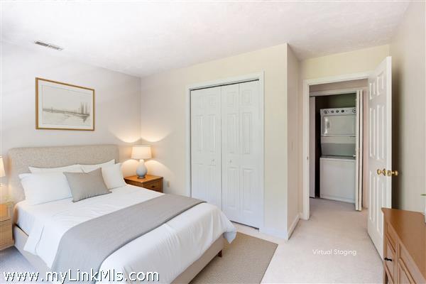 Bedroom 3 with view of hallway and laundry closet