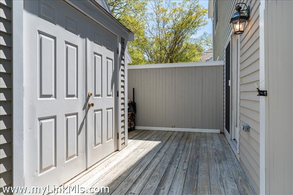 Storage shed, outdoor shower and kitchen access.