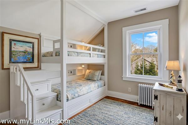Guest Room 1 reimagined as a Bunk Room (ai enhanced)