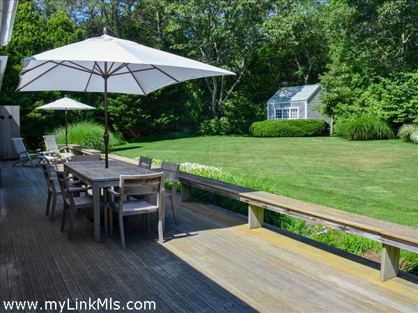 Back deck with Studio tucked in the corner of the property