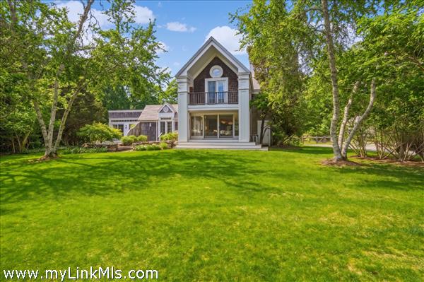 Front exterior with expansive front yard