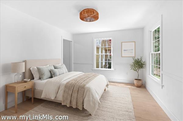 First floor bedroom, ensuite with walking in closet. Virtually staged.
