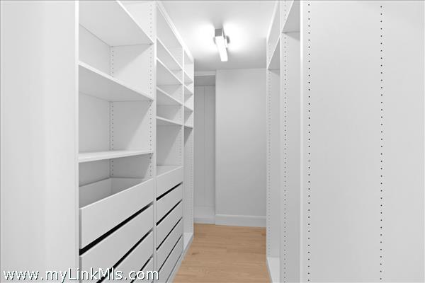 Walk-in closet 1st floor bedroom.