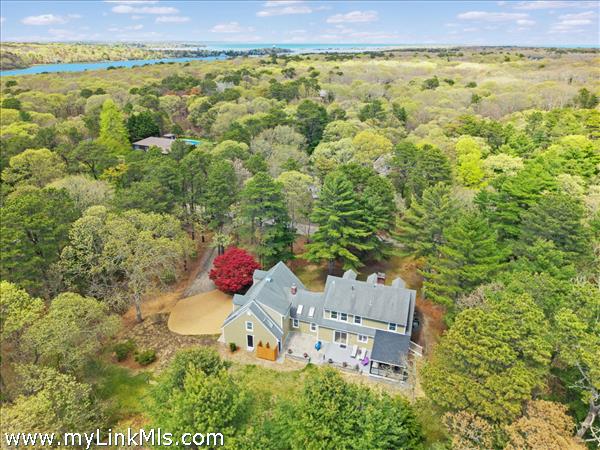 Walk to Lagoon Pond with deeded access and, access to the pristine Southern Woodlands Preserve comprising 292 acres maintained by the MV Land Bank.