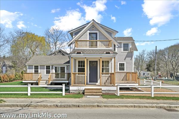 A welcoming front entrance with covered farmer's porch.