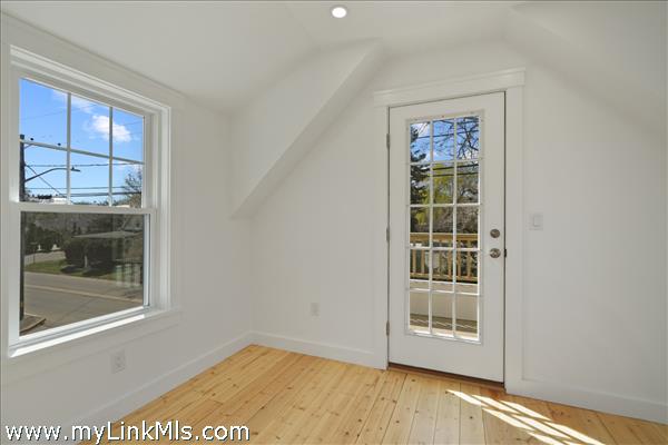Additional full bedroom with closet, climate control and outdoor second story deck.