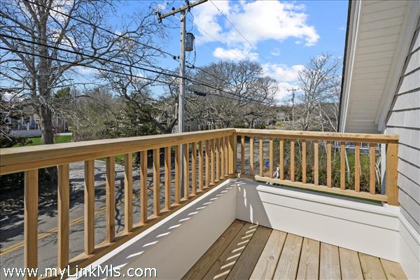 Outdoor deck, secondary level adjacent to bedroom.