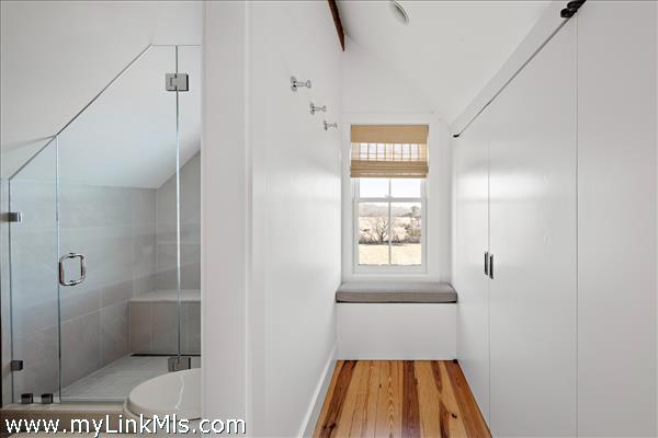 Guest House Primary Bathroom with closets on the right