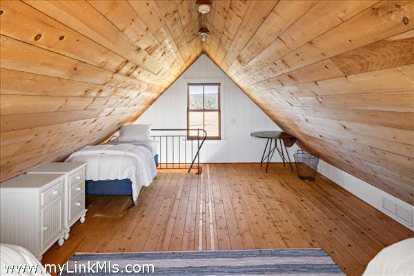 The Bunk House loft with 3 twin beds