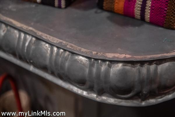 15-seat curved zinc bar