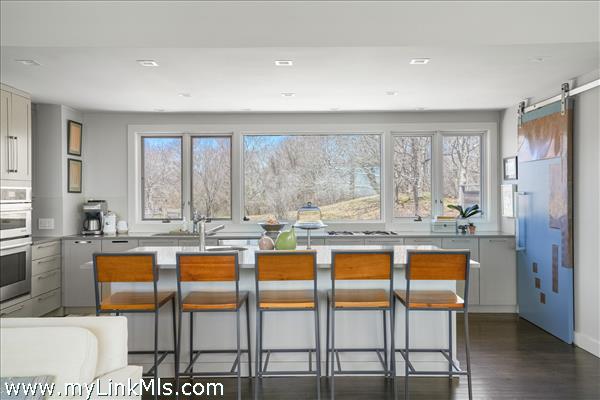 Views of the meadow, garden and stonewalls from the kitchen.