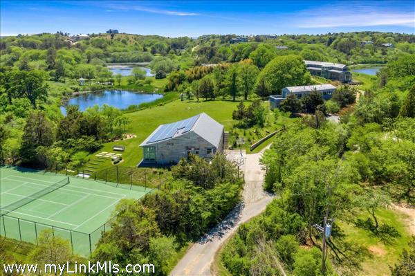 Barn with 6 Car Garage and Gym. Tennis Court