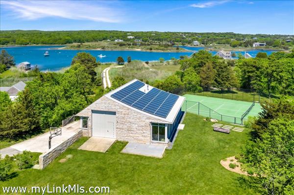 Barn with 6 Car Garage and Gym. Tennis Court