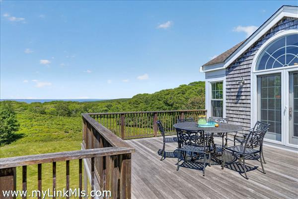 The perfect outdoor oasis for alfresco dining and panoramic coastal views