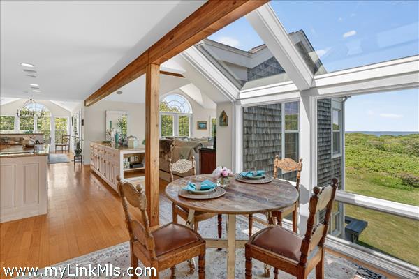 A perfectly scaled, intimate spot for casual morning coffee and daily meals.