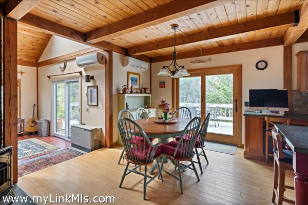 The dining room boasts a fabulous enamel pellet stove
