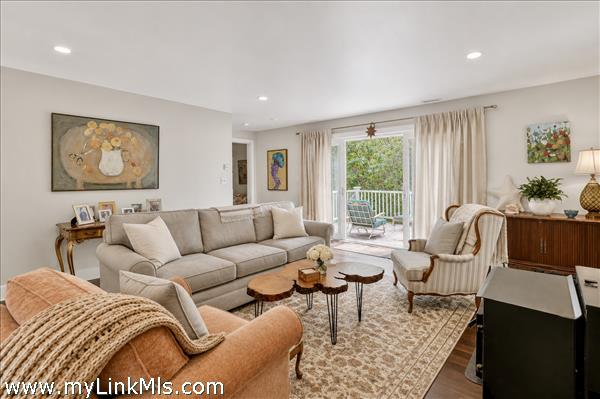 Living room with sliders to deck