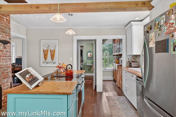 Kitchen Island and cabinets by French Accent