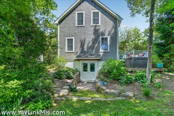Back of house with walk-out basement
