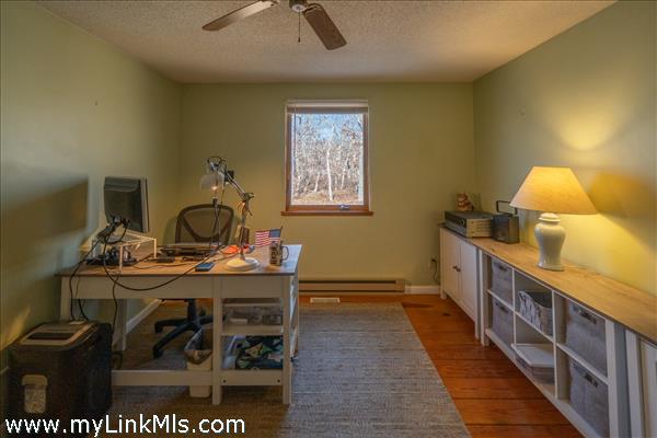 First floor guest bedroom being used as an office