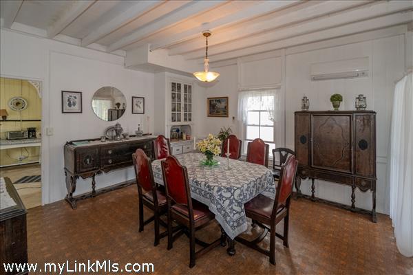 Dining area with energy efficient  mini split heating and cooling systems..