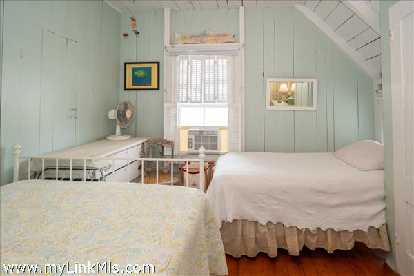Generous bedroom with natural light a