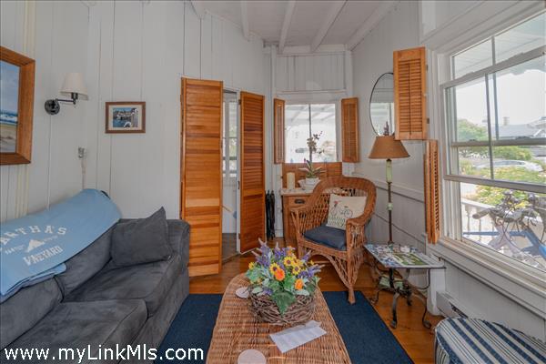 Cozy coastal den/tv room designed for relaxation and casual gatherings.