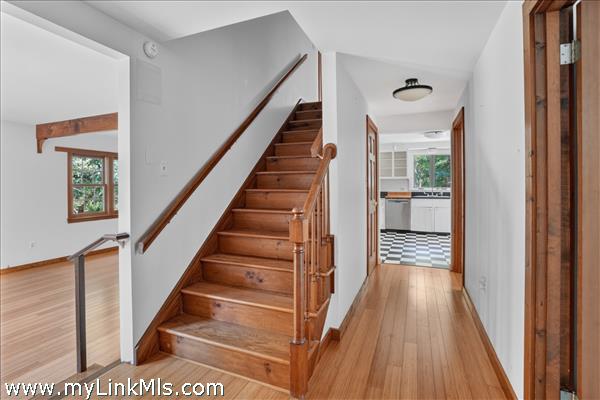 Front entry with stairs to second floor and 2 large spacious bedrooms
