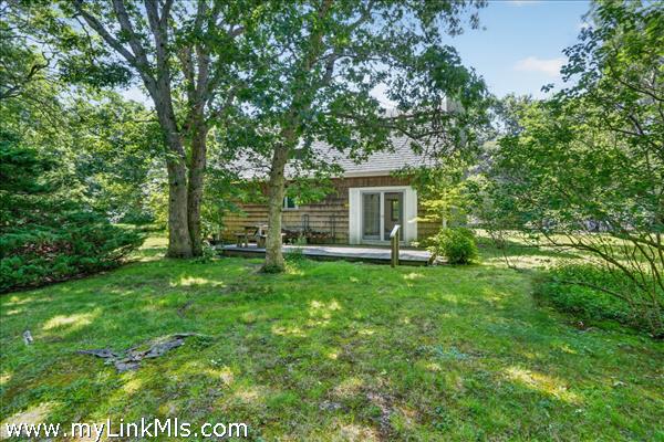 Rear of home with deck
